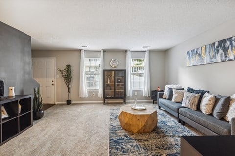 a living room with a couch and a coffee table